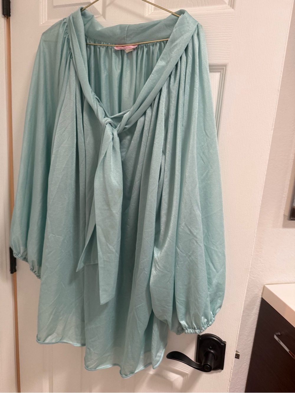 Nancy Austin of Las Vegas groovy vintage plus sized aqua tunic tie neck top 60s